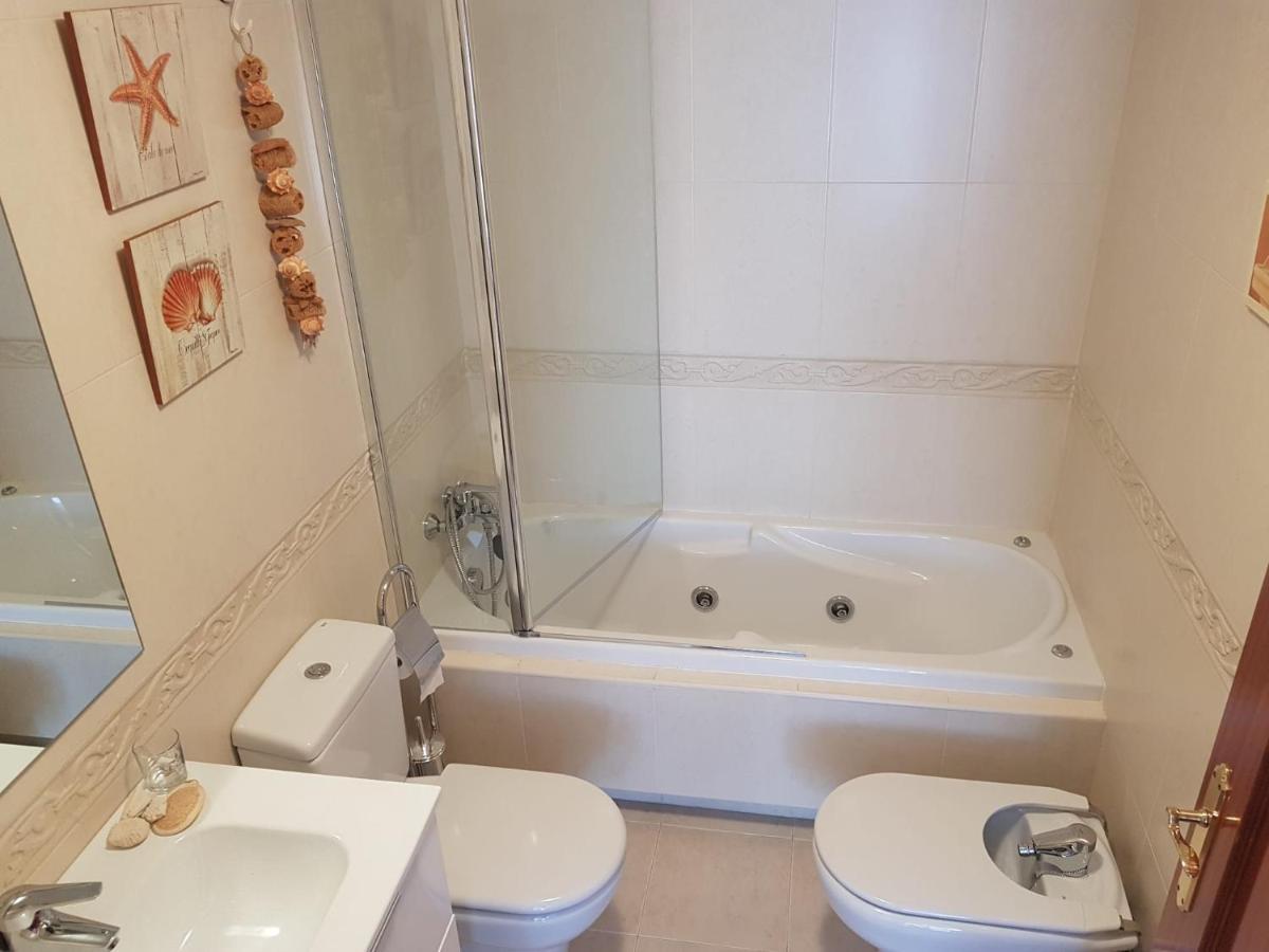 Apartamento En La Playa Con Parking Privado 게초 외부 사진